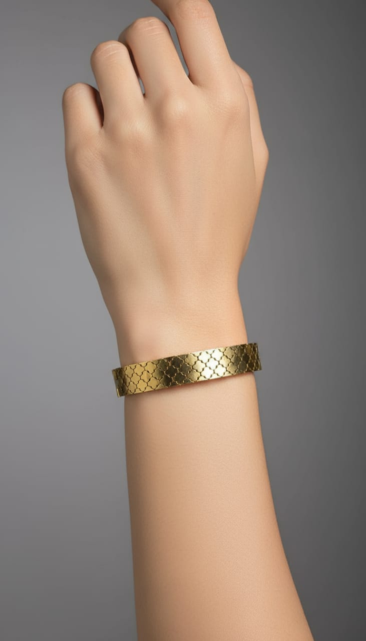 Elegant Gold Cuff with Intricate Design